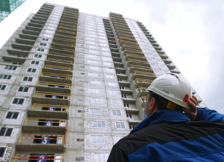 Путин напомнил застройщикам о штрафах за задержку передачи ключей